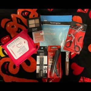 Facial mask, wipes, eyeshadow, lip gloss, lash curler, eyeliner, mascara, blush